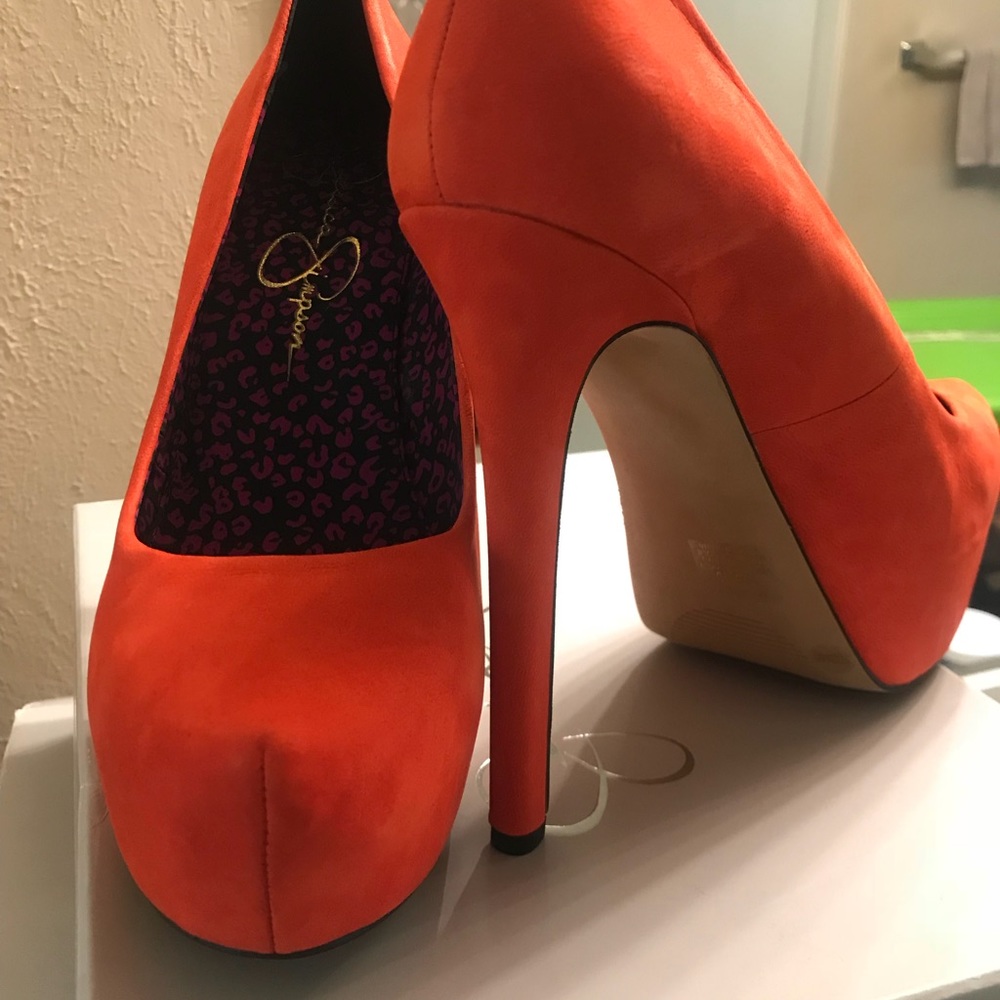 Bright orange stilettos